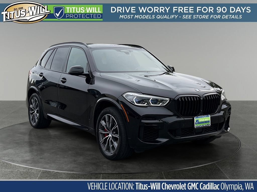 2022 BMW X5 M50i in Black — front three-quarter view
