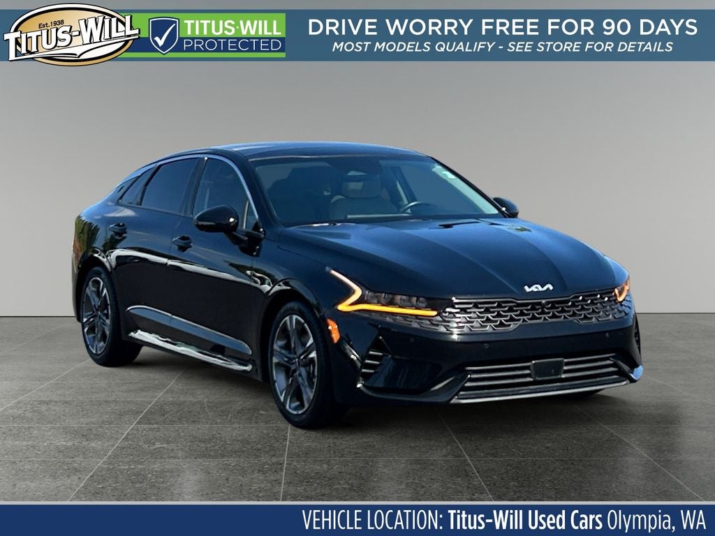2022 Kia K5 EX in Ebony Black — front three-quarter view