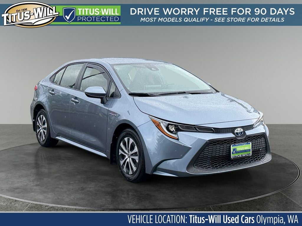 2021 Toyota Corolla Hybrid LE in Celestite — front three-quarter view