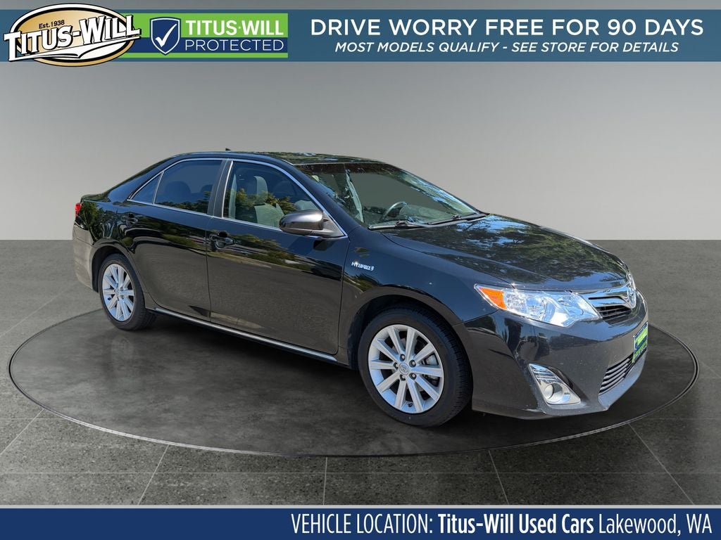 2012 Toyota Camry Hybrid XLE in Attitude Black Metallic — front three-quarter view