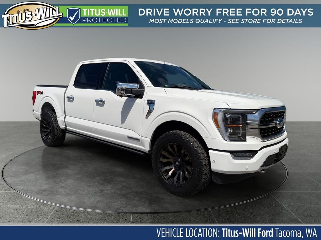 2021 Ford F-150 Platinum in White — front three-quarter view