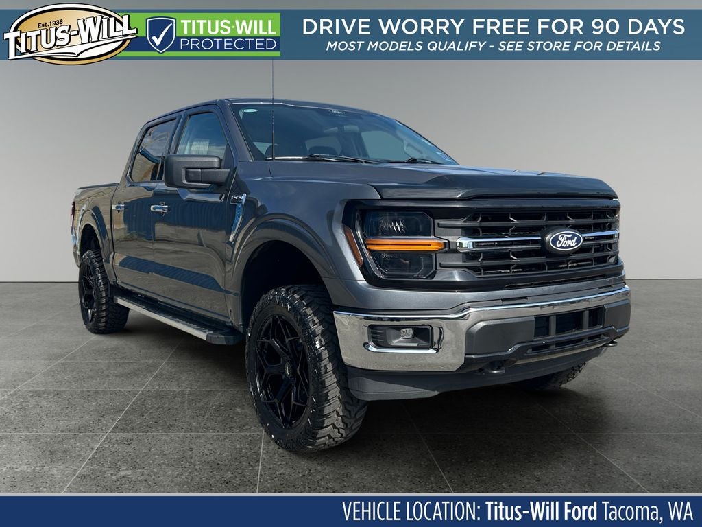 2025 Ford F-150 XLT Lifted in Gray — front three-quarter view