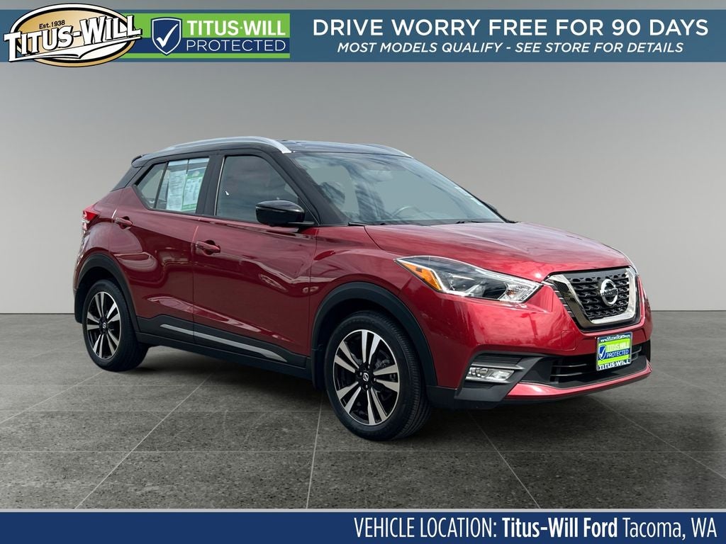 2019 Nissan Kicks SR in Cayenne Red — front three-quarter view