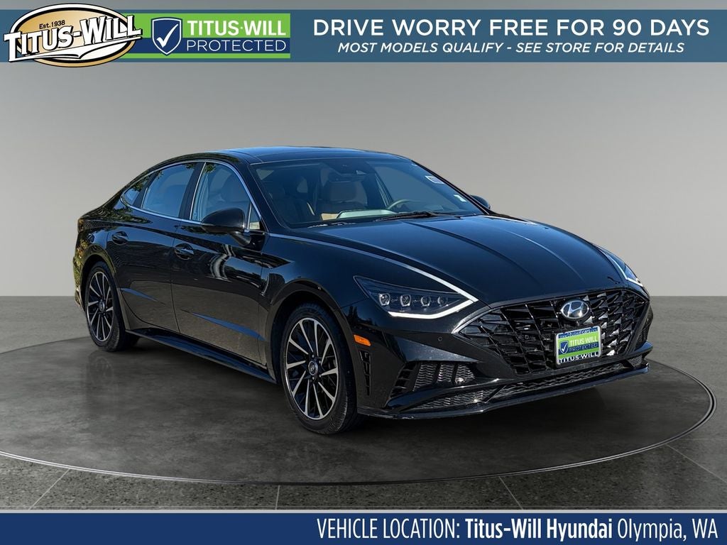 2021 Hyundai SONATA Limited in Phantom Black — front three-quarter view