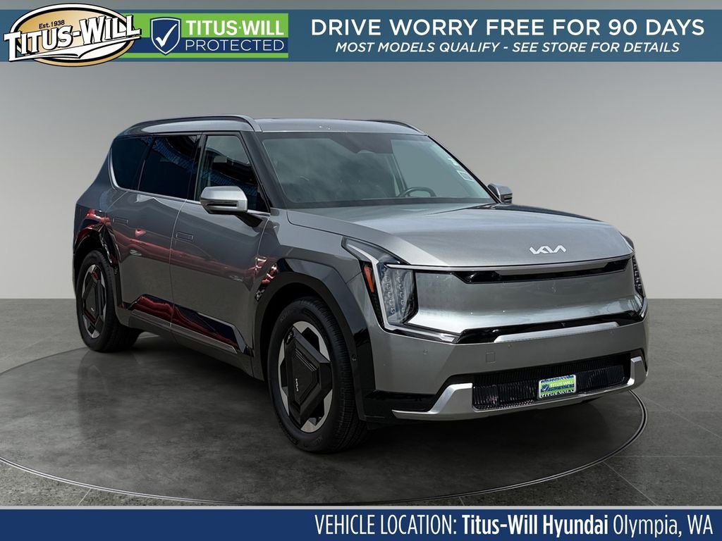 2024 Kia EV9 Land in Pebble Gray — front three-quarter view