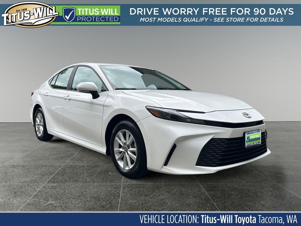 2025 Toyota Camry LE HYBRID in Ice Cap — front three-quarter view