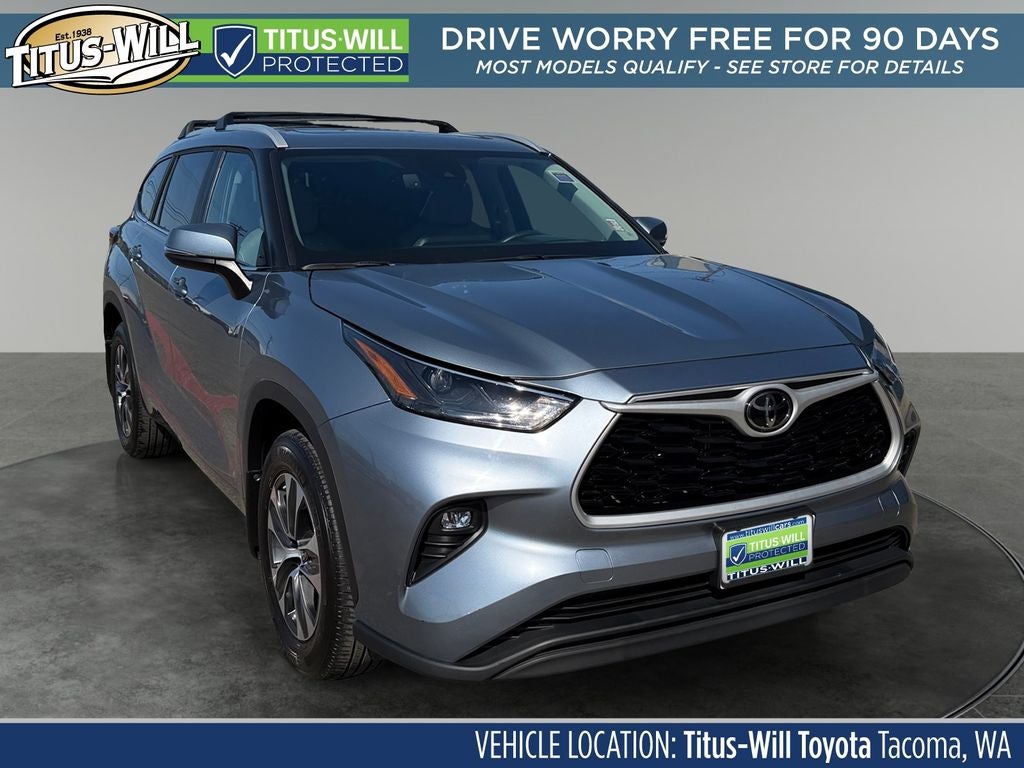 2024 Toyota Highlander XLE in Moon Dust — front three-quarter view