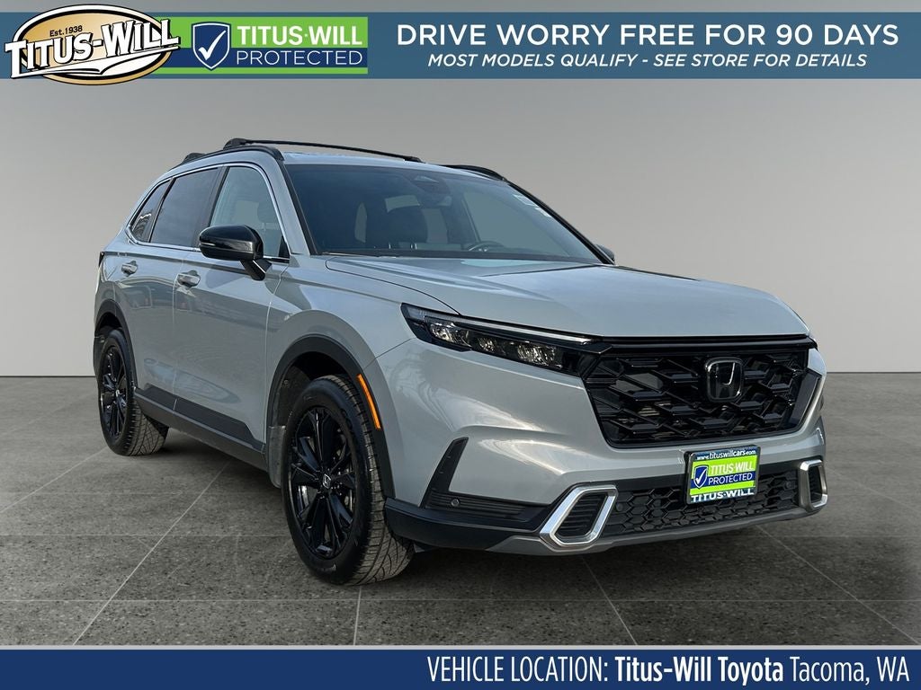 2024 Honda CR-V Hybrid Sport Touring in Gray — front three-quarter view