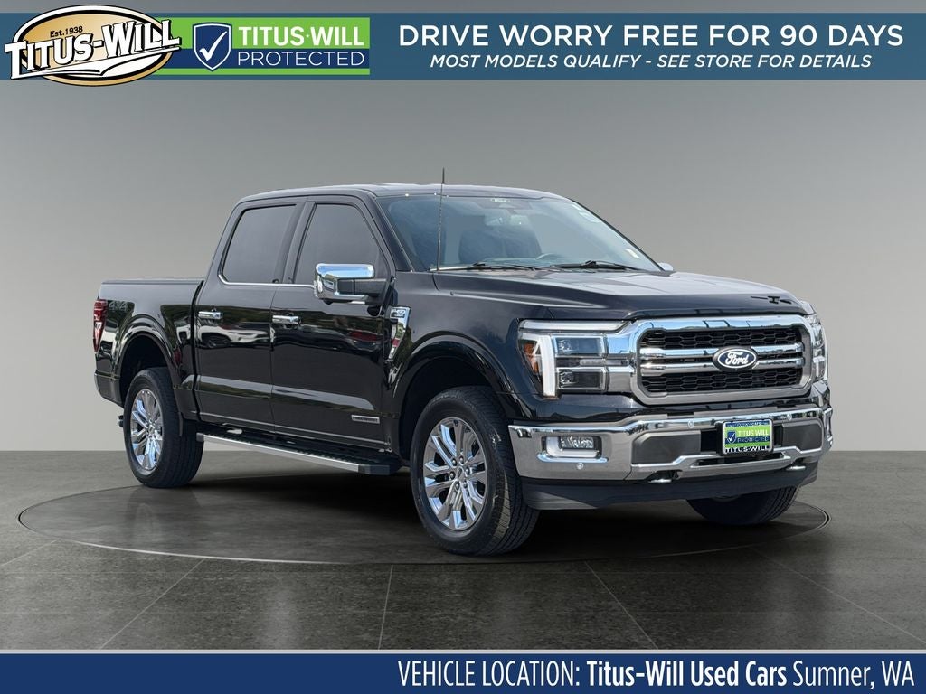 2024 Ford F-150 Lariat in Black Metallic — front three-quarter view