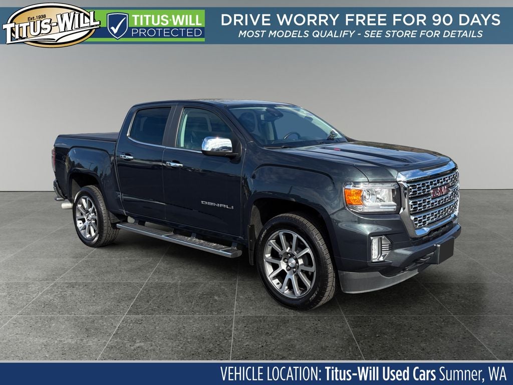 2021 GMC Canyon Denali in Hunter Green — front three-quarter view