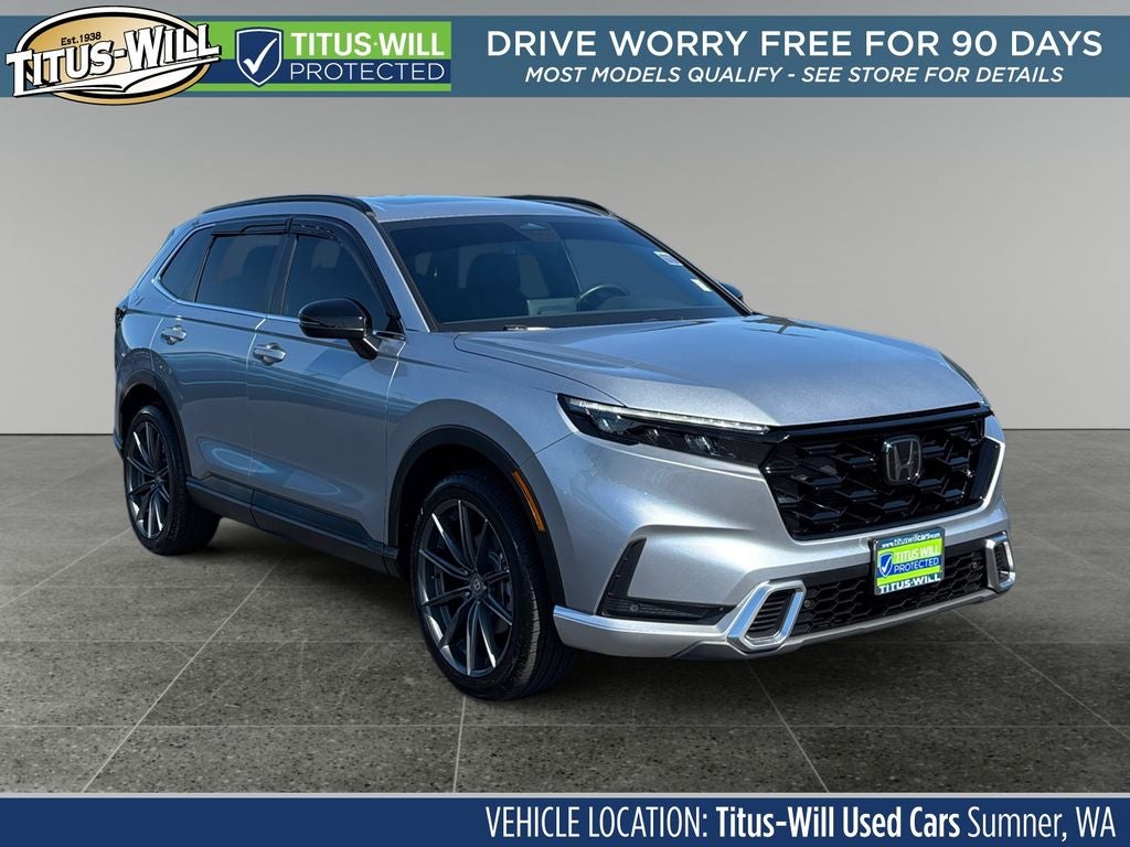 2024 Honda CR-V Hybrid Sport Touring in Silver — front three-quarter view